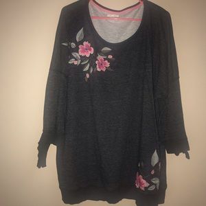 Black floral knit top.